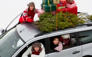 Christmas - family in car with gifts &christmas tree